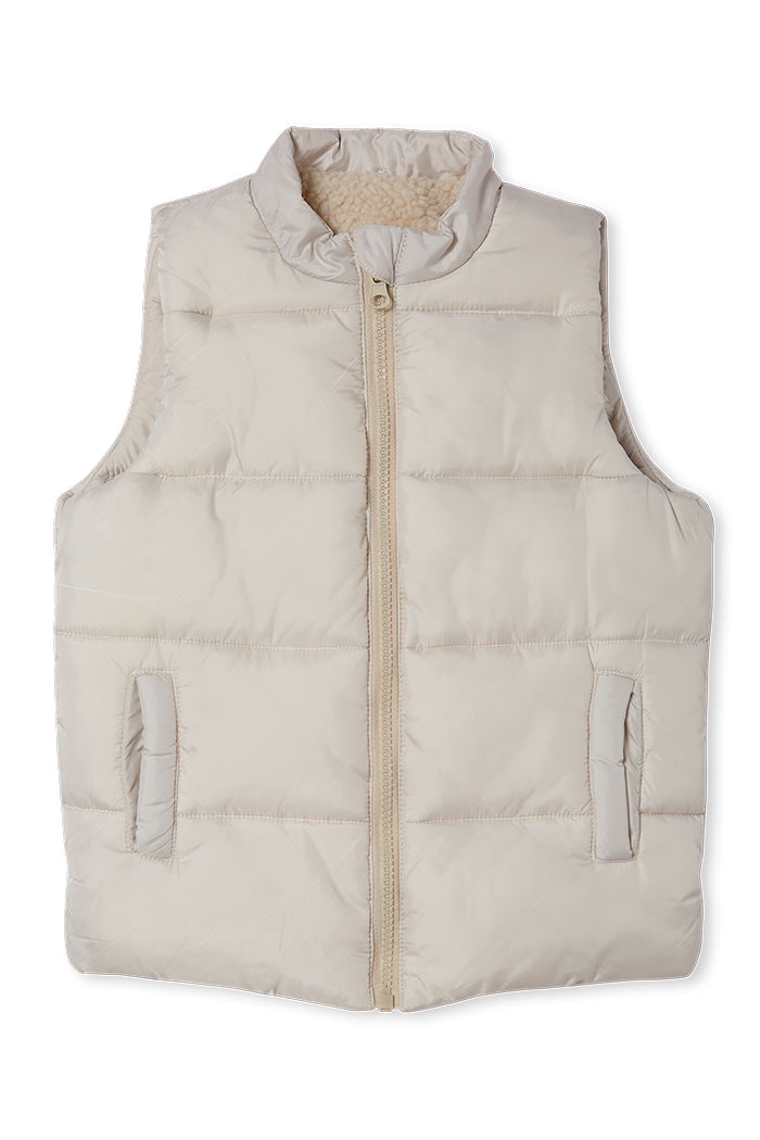 This girl’s sleeveless vest is the perfect clothing item for an active child during winter. Pair it with either a long sleeve tee or sweat and your little one will stay warm yet still comfortable this winter. 
